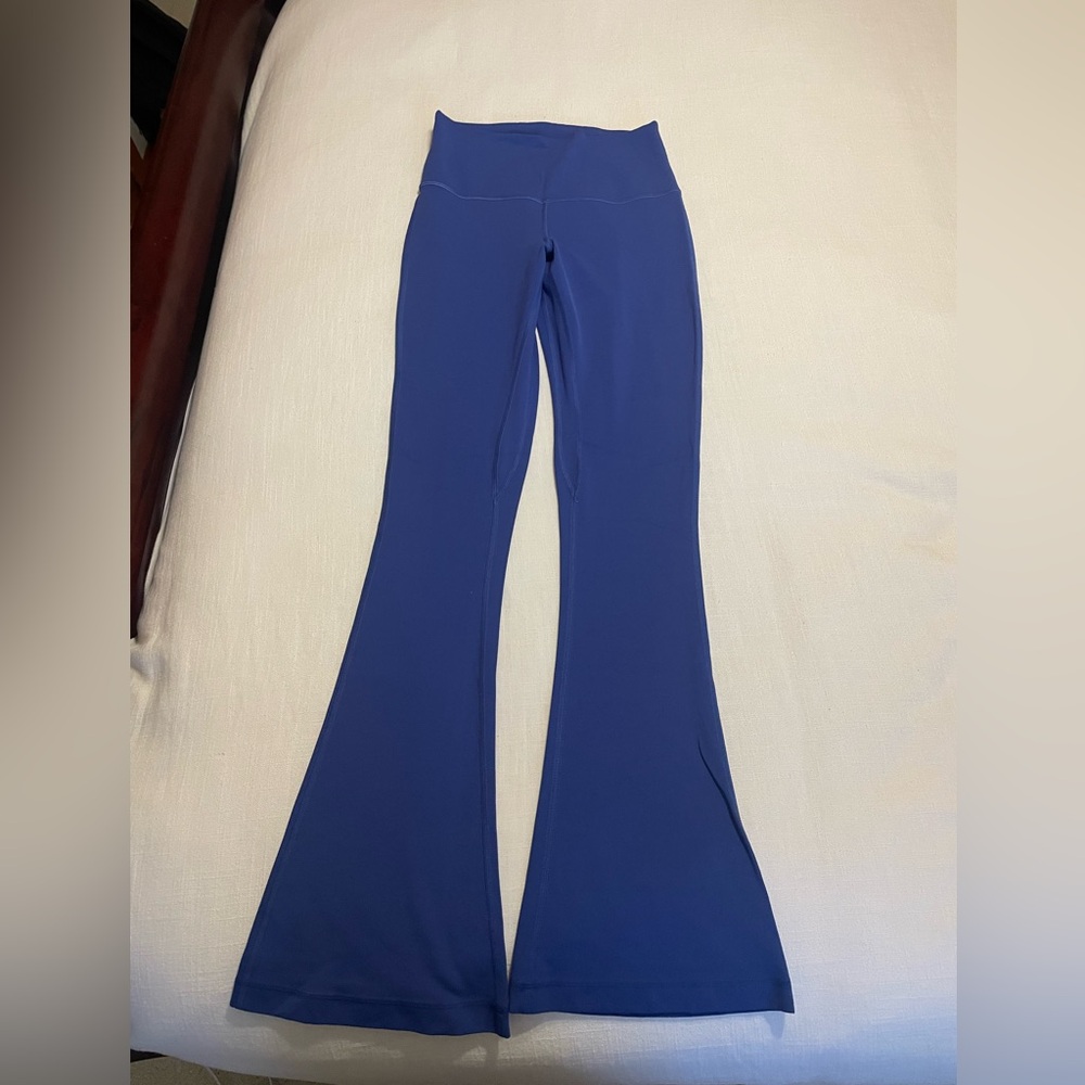 NWOT. Lululemon psychic blue mini flare pant size 6